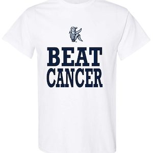 Shirt with Beat Cancer text and Cedar Rapids Kernels logo